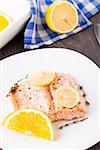 Delicious salmon fillet with citrus and thyme