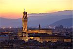 Sunset view of the Palazzo della Signoria tower, Florence, Italy