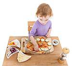 child making fresh pizza. studio shot isolated on white background