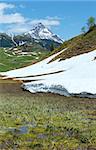 Summer mountain view to Biberkopf mount and snow thawing meadow (Warth, Vorarlberg, Austria).