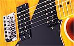vintage yellow six-string electric guitar, close up