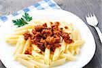 Delicious pasta with bolognese sauce on a plate