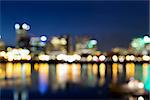 Portland Oregon Downtown Along Willamette River at Blue Hour with Out of Focus City Lights