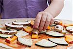 making homemade pizza with vegetable in close up shot