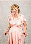 Desperate pregnant person in pink dress on gray background