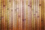 Wooden dirty background of varicolored bamboo boards