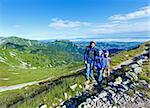 Family in Tatra Mountain, Poland, view from Kasprowy Wierch mount