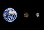 A rendered size comparison of the Jupiter Moon Callisto the Moon and Planet Earth on a clean black background.