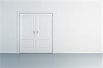 empty white room with closed door