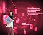 Composite image of student standing in a computer room and holding a folder while smiling