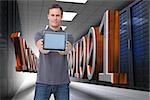 Composite image of young man showing screen of his tablet computer against a white background