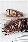 Zebra marble cake with chocolate glaze. Shallow dof