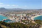 Panoramic view over Calp (Spain). Town bay beach