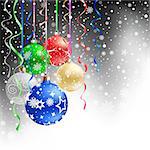 The multicolored christmas bauble and ribbons on the black mesh background