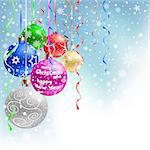 The multicolored christmas bauble and ribbons on the blue mesh background