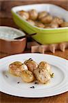 Roasted baby potatoes with thyme, olive oil and salt with tzatziki