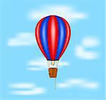 Hot air balloon flying on blue sky with clouds