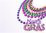 Mardi Gras beads background with place for text