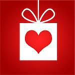 Red heart in gift. Red background. The concept of Valentine's Day