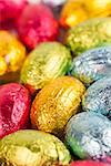 Background made from colorful chocolate Easter eggs