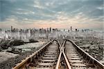 Railway tracks leading to big city
