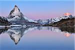 Matterhorn reflected in Lake Riffelsee at Dawn, Zermatt, Alps, Valais, Switzerland