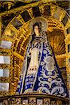 Close-up of altar with statue of Virgin Mary at Cathedral of Santo Domingo, Cusco, Peru