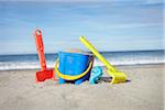 Toy Bucket, Shovel and Rake in Sand at Beach, Saint-Jean-de-Luz, Pyrenees-Atlantiques, France