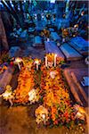 Honouring the Dead at Cemetery during Day of the Dead Festival at the Old Cemetery of Xoxocotlan, Oaxaca, Mexico