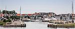 Houses, harbor and sailing boats, Marken, Netherlands