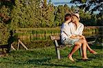 Romantic young couple on park bench, Gavle, Sweden