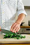 Person Cutting Parsley