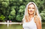 Woman with blond hair in a white shirt, portrait, Bavaria, Germany