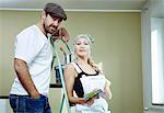 Couple renovating, woman holds color samples, Munich, Bavaria, Germany