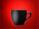 black mug on red background.