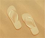 Flip Flops on beach sand
