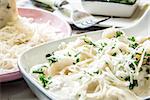 italian potato noodle with cheese sauce and basil