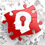 Psychological Concept - Profile of Head with a Keyhole Located on Red Puzzle.