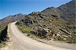 Gravel road heading up to the Swartberg Pass in the Oudtshoorn region of the Western Cape in South Africa.