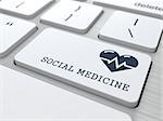 Social Medicine Words with Icon of Heart with Cardiogram Line on Button of White Modern Computer Keyboard.