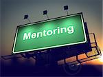 Mentoring - Green Billboard on the Rising Sun Background.