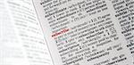 Word subscribe highlighted in red in dictionary