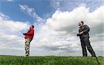 Two Man controls RC gliders in the sky