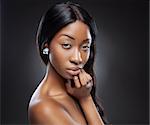 Young beautiful black woman with long hair