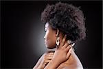 Profile view of a black beauty with afro hairstyle