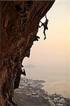 Rock climber at sunset, Kalymnos Island, Greece