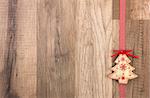 Christmas decoration with wood background, Christmas tree red with ribbon