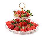 Fresh Strawberries on glass plate over white background