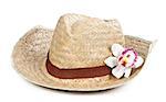 straw hat with a flower orchid isolated on a white background