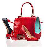 Red fashion women shoes and handbag over white